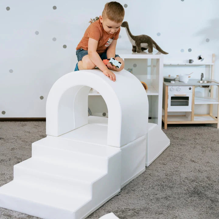 Climbing tunnel with slide ramp